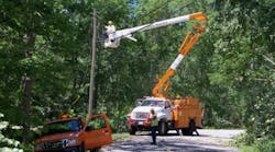 Central Maine Power Co. crews restoring power.