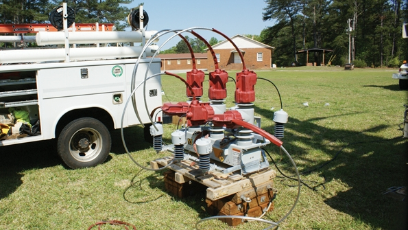 SSEMC crews streamlined the installation of field reclosers with detailed planning and by doing much of the work on the ground where equipment is more accessible and rubber gloves are not required Animal guards jumpers and mounting brackets are all readied for installation