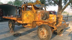 The 1943 digger truck as it was found in an open field, prior to its chassis-up restoration by Top Notch Repairs.