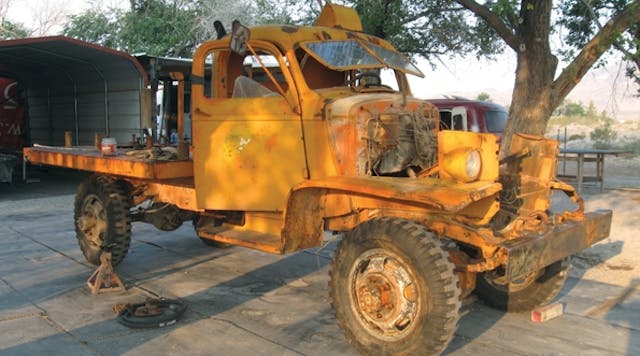 The 1943 digger truck as it was found in an open field, prior to its chassis-up restoration by Top Notch Repairs.