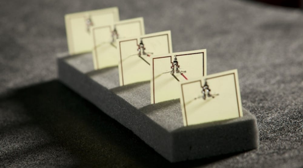 This five-cell metamaterial array developed by Duke engineers converts stray microwave energy, as from a WiFi hub, into more than 7 volts of electricity with an efficiency of 36.8 percent&mdash;comparable to a solar cell.