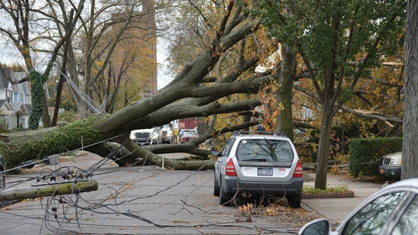 Workers on a doubledeadendangle structure during conductor clipin operations