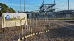 Groundbreaking shovels await. The current substation sits in the background.