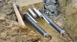 PVC conduits were installed at the 10 o’clock and 2 o’clock positions immediately outside the cable pipe for distributed temperature monitoring fibers. Temperature monitoring and communications fibers were placed in larger conduits located away from the cable pipes. PVC conduits were installed at the 10 o’clock and 2 o’clock positions immediately outside the cable pipe for distributed temperature monitoring fibers. Temperature monitoring and communications fibers were placed in larger conduits located away from the cable pipes.