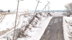 The effects of a snow storm on distribution lines.