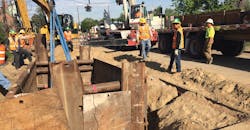 Crews install a vault at York Street and 37th Avenue in Denver to accommodate the relocation of Xcel Energy&rsquo;s transmission line 9542 using a cross-linked polyethylene (XLPE) cable system.