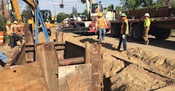 Crews install a vault using a cross-linked polyethylene (XLPE) cable system Crews install a vault using a cross-linked polyethylene (XLPE) cable system