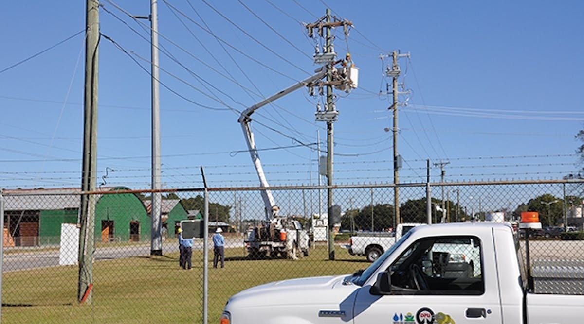 Crews install feeder automation technology on an Orangeburg DPU power line.