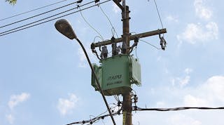 This is an example of a 45-kVA size-rated 75-kVA green transformer in a typical pole-mounted CPFL installation.