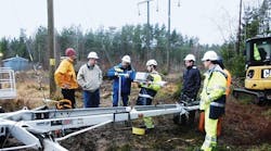 A P&ouml;yry Swedpower/Vattenfall/USi team performs on-site assembly of the weather station.