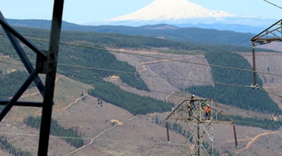 A BPA line maintenance crew makes an urgent repair with helicopter support in a rugged setting near Mount Hood.