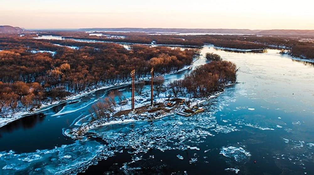 Construction crews working on the CapX2020 transmission line over the Mississippi River dealt with extreme weather challenges, including heavy rains, cold and ice.