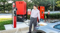 A driver charges at one of the new Georgia Power EV charging islands now open across the state. Georgia Power will open more than 60 of these islands by the end of 2016.