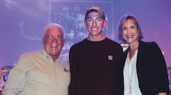 Dennis Kerr, chairman of the ILRA scholarship committee, MeeShan Schmidt, recipient of the Bob Rengal Lineman&rsquo;s Scholarship, and Cindy Curry from Solomon Corp. (scholarship sponsor) were all smiles at the national awards banquet.