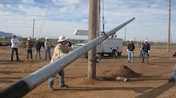 Steel pole training sessions include field and classroom instruction where linemen and students are taught safe work practices associated with installing and maintaining steel utility poles.