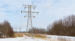 Since 1871, an active railway has crossed Hamlin Marsh, and in the 1920s, crews built a 115-kV transmission line just 50 feet from the track on a parallel line. To improve reliability, National Grid endeavored to reconductor 7 miles of this decades-old line with minimal impact to the environment.