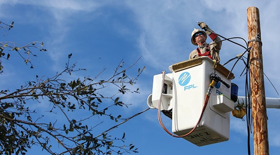 An FPL line worker helps restore power in a tornado-ravaged area in Sarasota in January 2016. On average, hardened power lines perform 40% better than lines that have not been hardened, helping restore power faster after severe weather.
