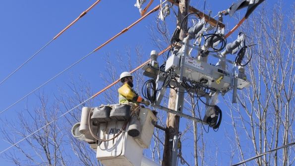 A PPL Electric Utilities line worker installs a smart grid switch in their Pennsylvania service territory The company recently implemented the technology which enables automated power restoration in minutes