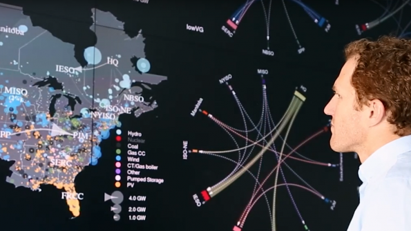 NRELs David Palchak coauthor of the Eastern Renewable Generation Integration Study examines data visualizations developed with computing resources in NRELs Energy Systems Integration Facility