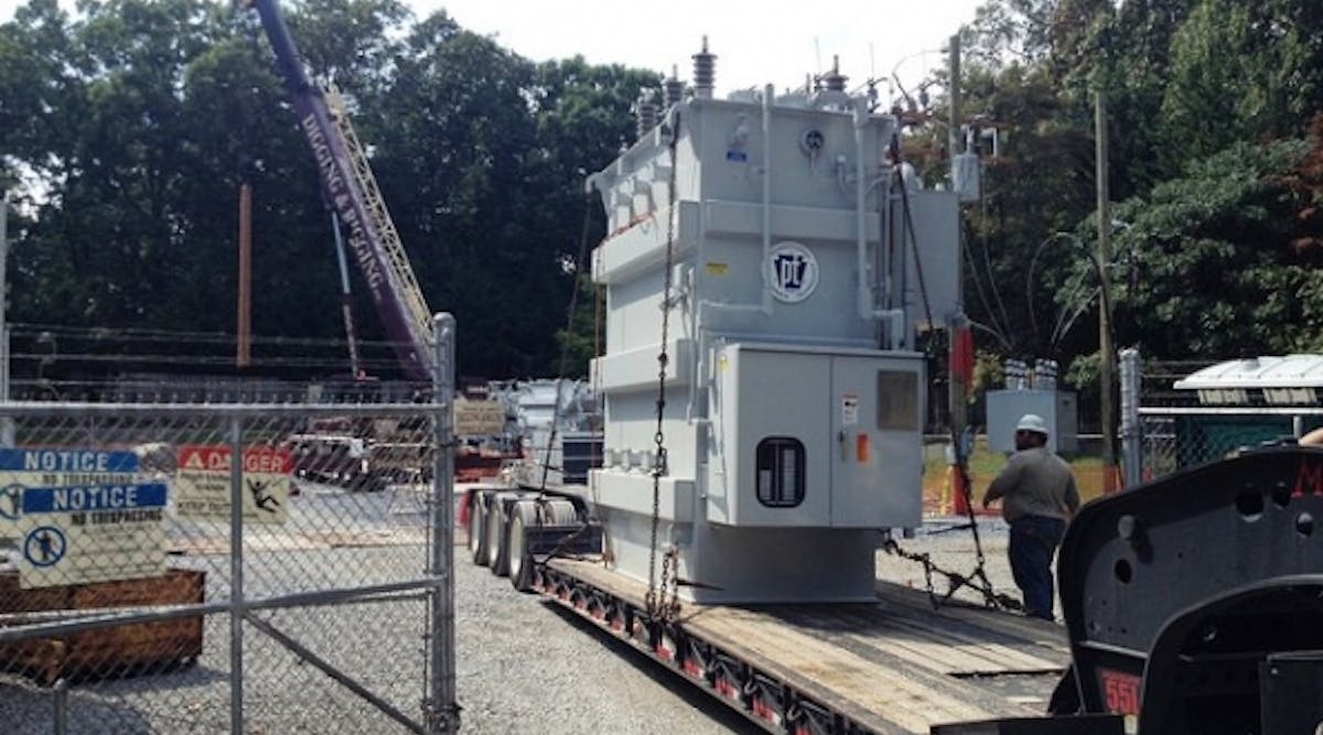 The first of two new transformers is delivered to a Potomac Edison distribution substation near Mt. Airy.