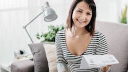 woman holding bill woman holding bill