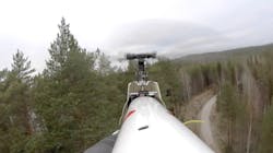 UAV on a mission over power lines. UAV on a mission over power lines.