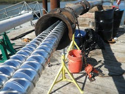 High-pressure gas-filled cable is pulled from the temporary work platforms into steel conduit.