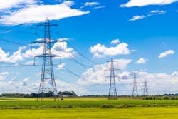 row of transmission towers row of transmission towers