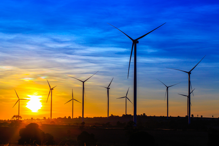 wind turbines at sunset