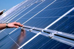 solar panel with hand installing solar panel with hand installing