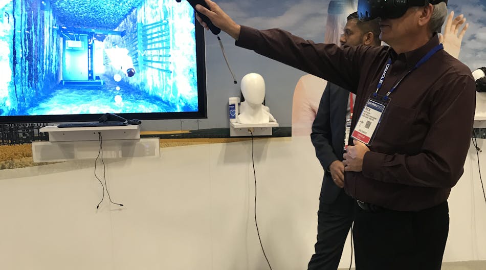 Editor Rick Bush experiences VR at the GE booth