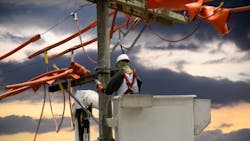 Lineman working on pole Lineman working on pole