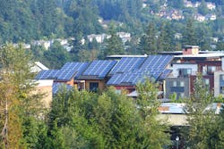 Townhomes with Modern Solar Panels on Roof Townhomes with Modern Solar Panels on Roof