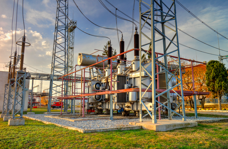 Power transformer in high voltage switchyard in modern electrical substation