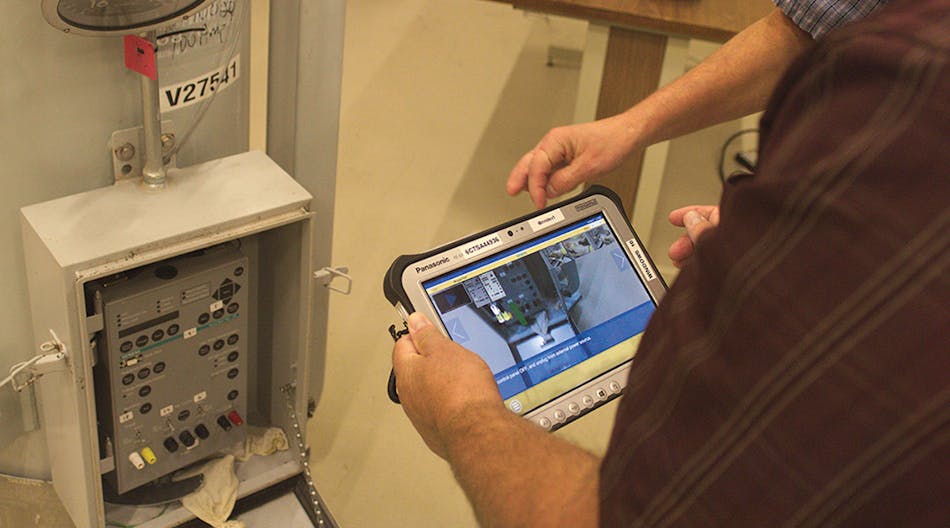 Workers test the step-by-step troubleshooting instructions built into Index AR Solutions&rsquo; augmented reality application.