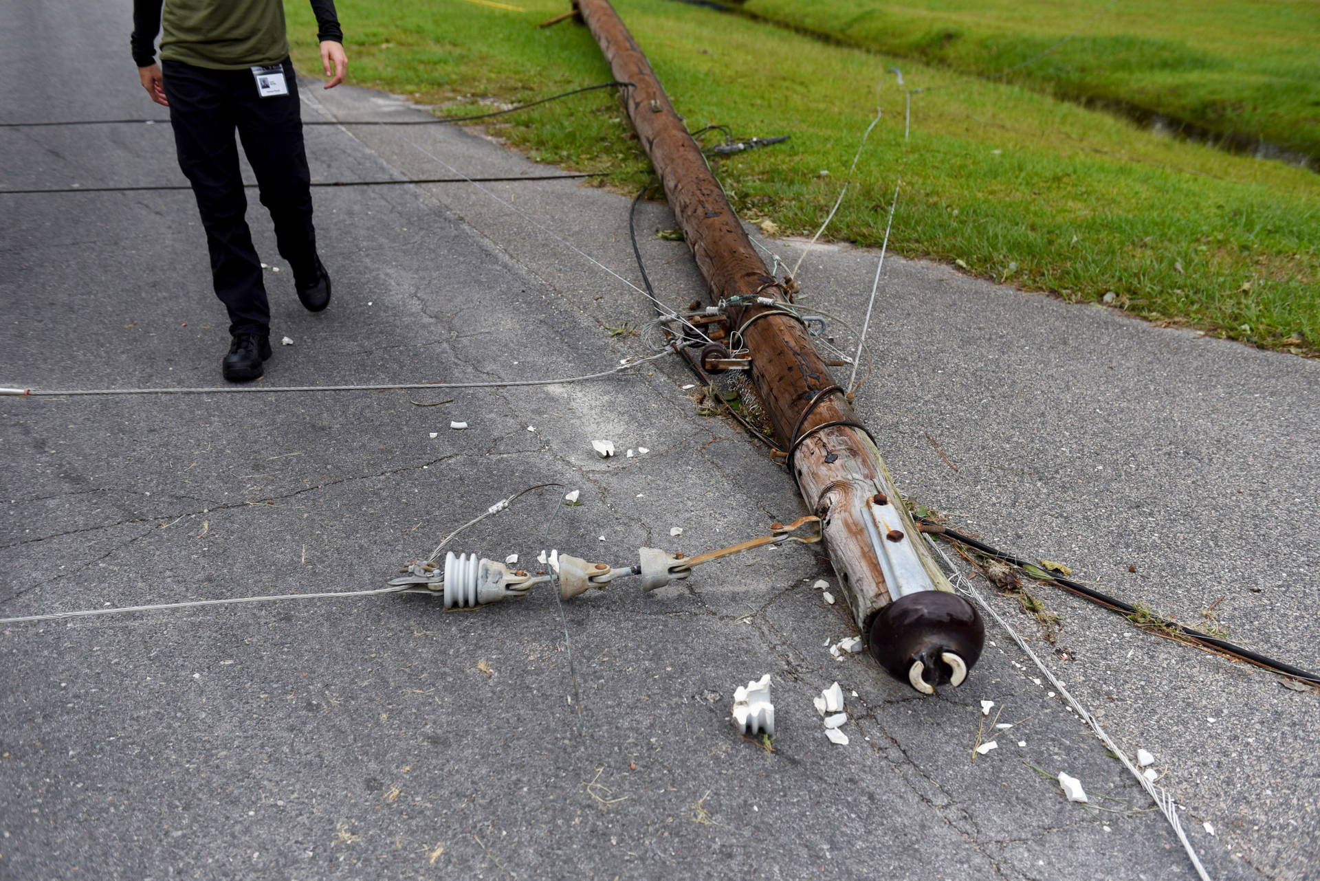 A fallen utility pole lays damaged after Hurricane Florence hit in Castle Hayne, North Carolina, U.S., on Monday, Sept. 17, 2018.