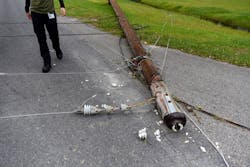 A fallen utility pole lays damaged after Hurricane Florence hit in Castle Hayne, North Carolina, U.S., on Monday, Sept. 17, 2018. A fallen utility pole lays damaged after Hurricane Florence hit in Castle Hayne, North Carolina, U.S., on Monday, Sept. 17, 2018.