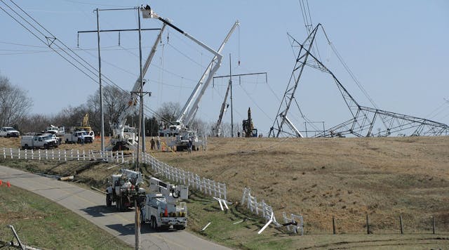 TVA construction crews work on tower and pole structure restoration of tornado damage in 2011.