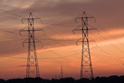 Power lines and Cell Tower at sunset Power lines and Cell Tower at sunset