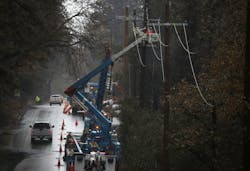 Pacific Gas and Electric (PG&E) crews repair power lines Pacific Gas and Electric (PG&E) crews repair power lines