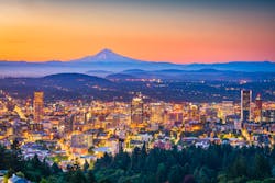 Portland, Oregon, USA skyline at dusk with Mt. Hood in the distance. Portland, Oregon, USA skyline at dusk with Mt. Hood in the distance.