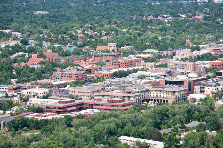 telephoto view of downtown Boulder, Colorado seen from above.