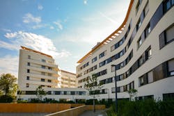New residential and commercial building with modern facade in the city New residential and commercial building with modern facade in the city