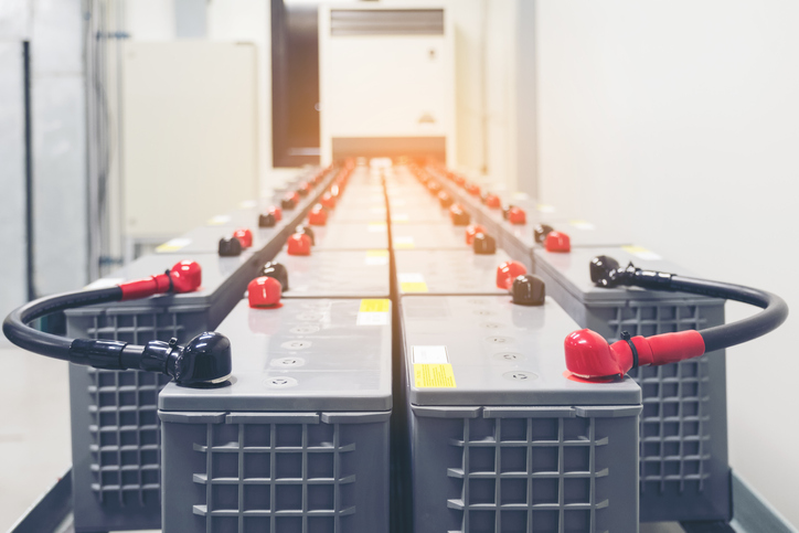Rows of batteries in industrial backup power system