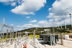 Power substation and wind turbines generate renewable green energy Power substation and wind turbines generate renewable green energy