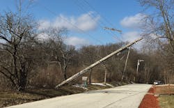 An electricity pole keeling over An electricity pole keeling over