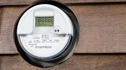 A smart meter with its screen showing readings