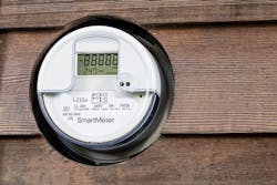 A smart meter with its screen showing readings A smart meter with its screen showing readings