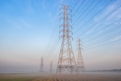 Electric poles on a foggy morning Electric poles on a foggy morning