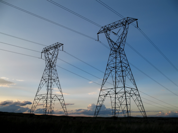Electric transmission towers and overhead lines